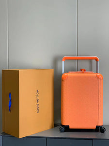 CUSTOM TAURILLON ORANGE 37L HORIZON 55 SUITCASE