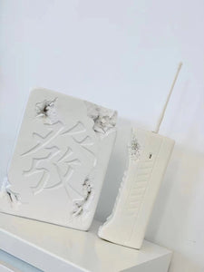 ERODED MOBILE PHONE RELIC